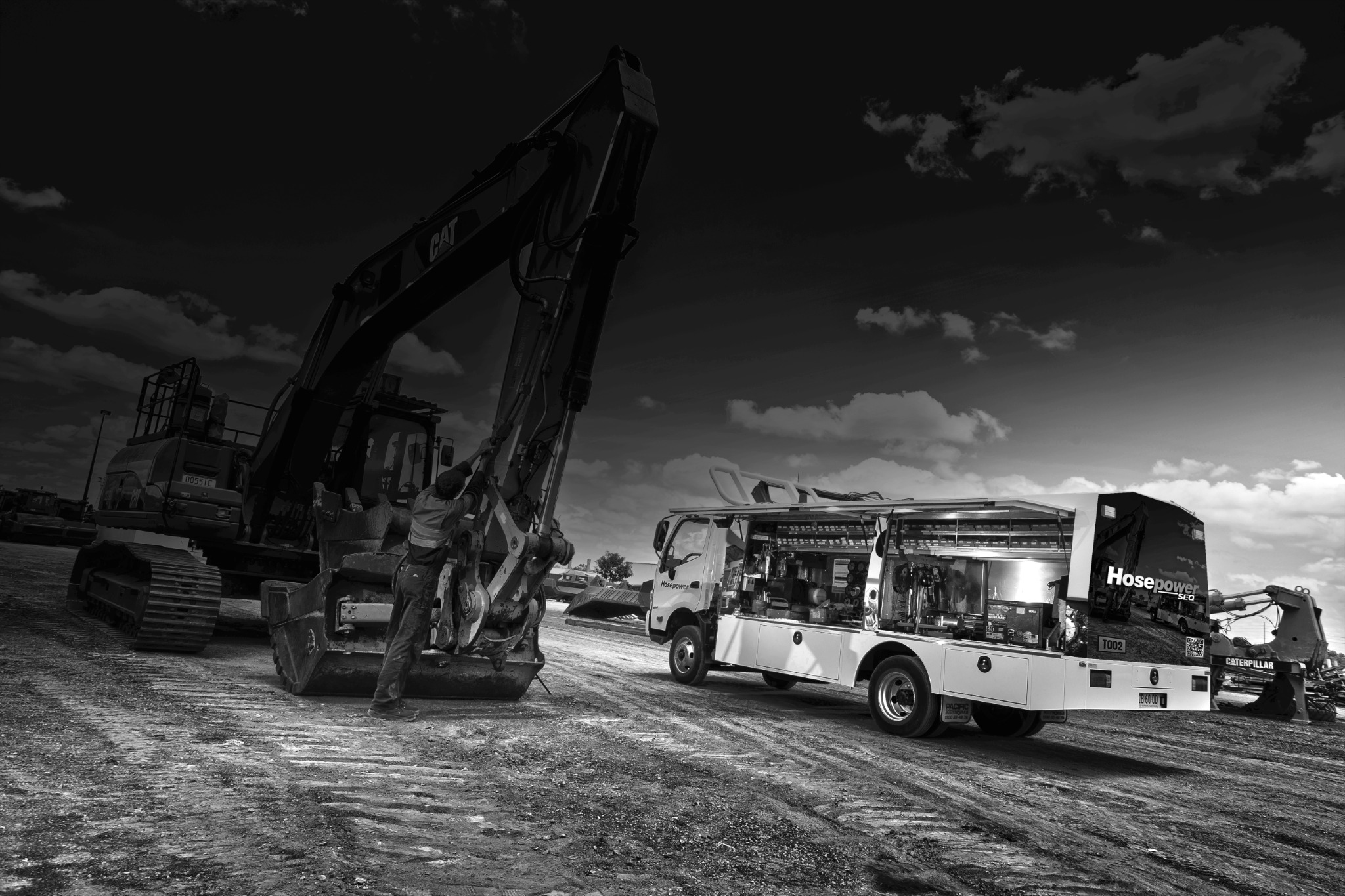 Hosepower SEQ service truck attending earthmoving equipment